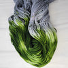 Folklore - Hand dyed sock yarn - grey and moss green speckled assigned color pooling yarn Taylor Swift inspired