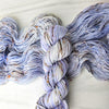 Periwinkle Fungi - Hand dyed yarn - pastel periwinkle with brown rainbow speckles