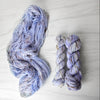 Periwinkle Fungi - Hand dyed yarn - pastel periwinkle with brown rainbow speckles