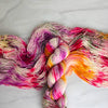 Music Box - Hand dyed yarn, orange fuchsia magenta purple white green speckled - Andrea Gibson Poetry inspired