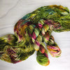 Rose Garden Filled With Thorns - Hand dyed variegated yarn - moss green forest lichen with burgundy maroon pops