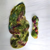 Rose Garden Filled With Thorns - Hand dyed variegated yarn - moss green forest lichen with burgundy maroon pops
