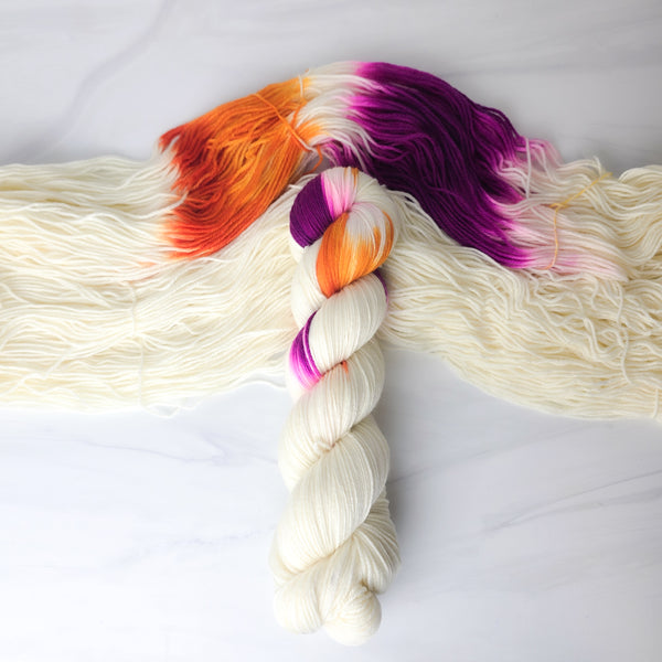 Lesbian Flag Girl Crush AP Style - assigned pooling variegated yarn -white yarn with a purole orange pop - LGBTQIA gay pride