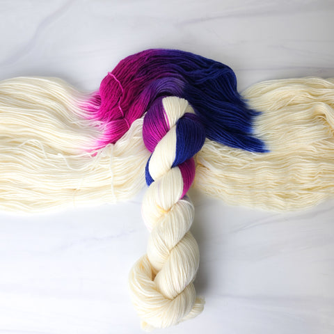 Bisexual both is good AP Style - assigned pooling variegated yarn -white yarn with a pop of pink purple blue  - LGBTQIA gay pride