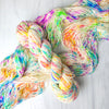 Fabulous Confetti - Hand dyed yarn, white with splashes of rainbow of fuchsia magenta yellow blue purple orange