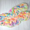 Fabulous Confetti - Hand dyed yarn, white with splashes of rainbow of fuchsia magenta yellow blue purple orange