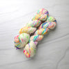 Fabulous Confetti - Hand dyed yarn, white with splashes of rainbow of fuchsia magenta yellow blue purple orange