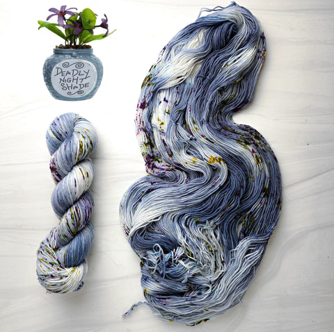 Deadly Nightshade - Hand dyed yarn - Nightmare Before Christmas inspired collection - blue grey with speckles purple green moss