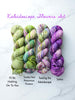 Kaleidoscope Flowers yarn set - four full sized 100g skeins of Hand dyed yarn - speckled green and purple colors dyed to order
