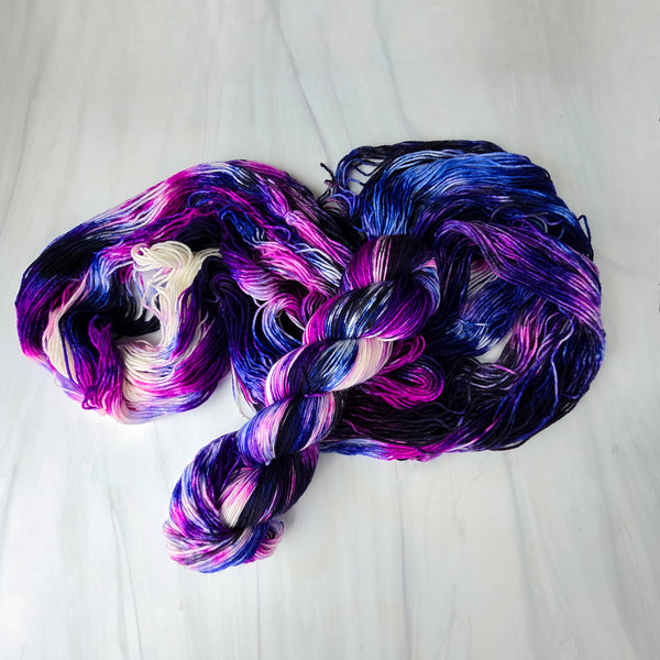 Nyx - Hand dyed yarn, Fingering Weight, speckled inspired by ACOTAR by Sarah J Maas -  White with black blue berry pink purple similar to Feyre and Rhysand colorways