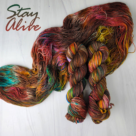 Stay Alive - Hand dyed Variegated yarn -  transformation series - twenty one pilots inspired - Fingering to bulky-  brown caramel rust rainbow with pink blue yellow pops 21 pilots