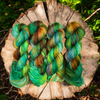 Light in the Forest -  Hand dyed variegated yarn - green purple blue lime toffee maroon