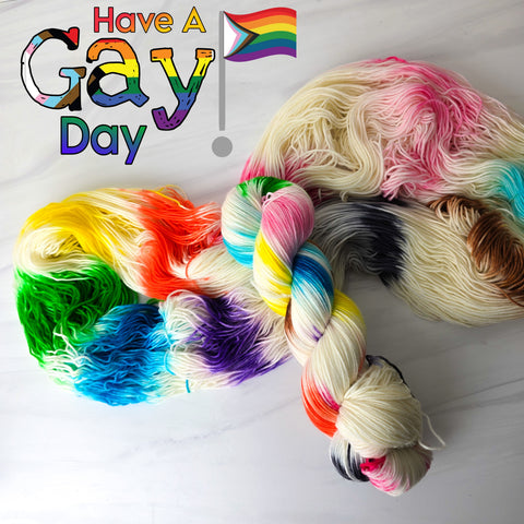Have a Gay Day - LGBTQIA plus brown back trans flag - Hand dyed variegated yarn - white with roygbiv rainbow stripes  gay pride LGBTQ
