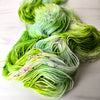 Plant Seeds in the Cracks - Hand dyed yarn, bright green soft teal white avocado lime with teal and purple pink speckles - Andrea Gibson Poetry inspired