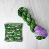 Allium - Hand dyed assigned pooling yarn - leafy grass evergreen green with a pop of lilac purple