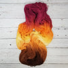 Chase the Light - Hand dyed variegated yarn - yellow orange brown maroon palindrome