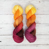 Chase the Light - Hand dyed variegated yarn - yellow orange brown maroon palindrome