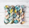 Flower Girl - Hand dyed variegated speckled yarn - Merino Fingering to worsted teal white pink brown yellow