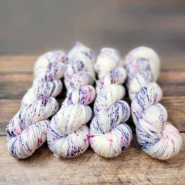 Verbena - Hand dyed variegated yarn - Merino Fingering to worsted white with purple lilac violet lavender speckles