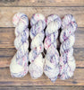 Verbena - Hand dyed variegated yarn - Merino Fingering to worsted white with purple lilac violet lavender speckles