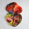 Psychedelic Red Panda - Hand dyed sock yarn - red blue yellow rainbow
