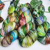Light in the Forest -  Hand dyed variegated yarn - green purple blue lime toffee maroon
