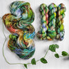 Light in the Forest -  Hand dyed variegated yarn - green purple blue lime toffee maroon