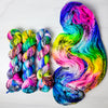 Painted Palette-  Hand dyed variegated yarn - neon pink fuchsia yellow turquoise purple black spatters
