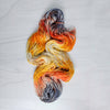 Dead Man's Hand -  Hand dyed variegated yarn - grey orange tan speckles