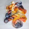 Dead Man's Hand -  Hand dyed variegated yarn - grey orange tan speckles