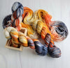 Dead Man's Hand -  Hand dyed variegated yarn - grey orange tan speckles