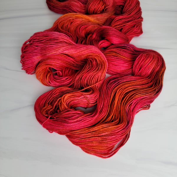 September - Hand dyed sock yarn - red orange burgundy
