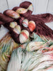 Antique Chocolate - hand dyed yarn, Fingering Weight, assigned color pooling - dark chocolate brown with contrasting color of light yellow orange green red
