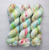 Zombie Chow - Hand dyed yarn, Fingering Weight, Halloween yarn -light lime teal green red speckles