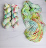 Zombie Chow - Hand dyed yarn, Fingering Weight, Halloween yarn -light lime teal green red speckles