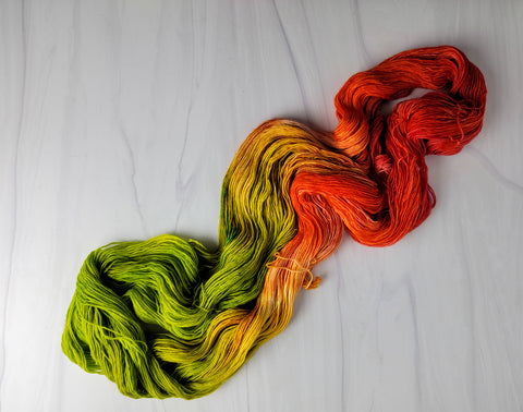 Glowing Pumpkin - Hand dyed yarn - SW Merino Fingering - orange green