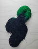 Emerald Star - Hand dyed assigned pooling yarn - lord huron inspired black and green
