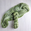 Rhea - Hand dyed Variegated yarn -  Fingering to bulky- Greek Goddess collection pastel sage green with speckles