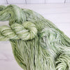 Rhea - Hand dyed Variegated yarn -  Fingering to bulky- Greek Goddess collection pastel sage green with speckles