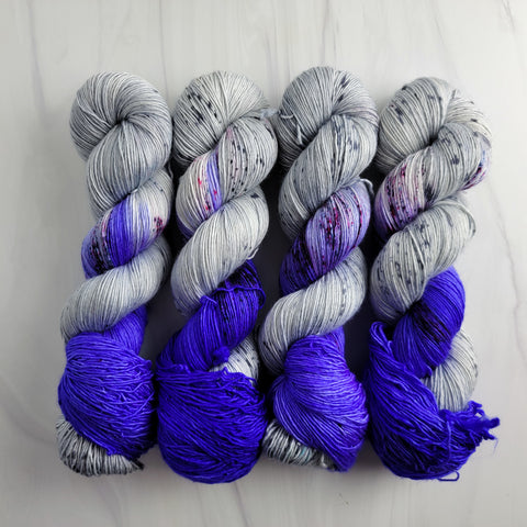 Pepper Violets - Hand dyed assigned color pooling yarn - SW Merino Fingering Weight grey blue violet