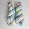 Eos - Hand dyed variegated yarn - Greek Goddess collection SW Merino Fingering Weight pastel grey blue yellow peach pink speckles