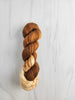 Praline - Hand dyed assigned color pooling yarn - SW Merino Fingering Weight warm brown and cream with speckles