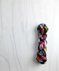 City Rain- Hand dyed yarn black rainbow speckled