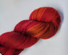 September - Hand dyed sock yarn - red orange burgundy