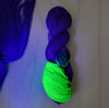 Medusa - Hand dyed assigned pooling yarn - blue violet and green glows under black light