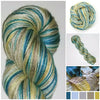A Touch of the Blues - Hand dyed variegated yarn - gold ivory cream blue teal brown