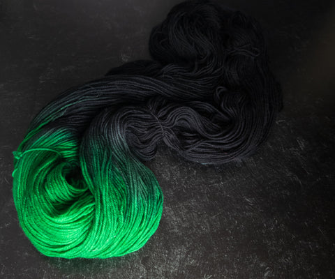 Emerald Star - Hand dyed assigned pooling yarn - lord huron inspired black and green
