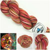 Skinbow Zebrafish- Hand dyed yarn - Merino Fingering red brown green pink