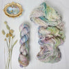 Pieces of April - Hand dyed sock yarn - pastel sage grey with speckles of pink blue green toffee