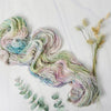 Pieces of April - Hand dyed sock yarn - pastel sage grey with speckles of pink blue green toffee